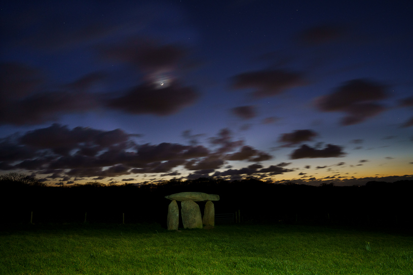 Waxing crescent moon at Carwynnen Quoit 